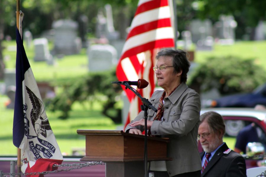 Mayor Ann Campbell welcomes the public to the Ames Municipal Cemetery at the start of the Memorial Day service.