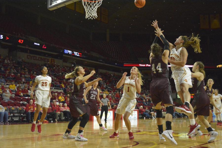 Claire Ricketts, forward, tries to score a basket for the Cyclones during the Iowa State versus Wisconsin-La Crosse game on Nov. 5. The Cyclones won 93-50.