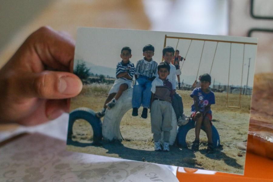 Hugo Bolanos (front, in white shoes) grew up in Michoacan, Mexico. He remembers the playground at his elementary school being surrounded by dirt.