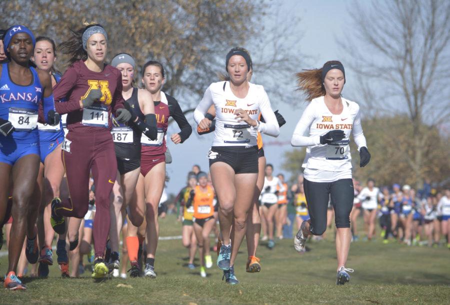 Iowa+State+distance+runners+Cailie+Logue+and+Anne+Frisbie+run+side+by+side+during+the+womens+6k+at+the+NCAA+Cross+Country+Midwest+Regional+held+at+Iowa+State+on+Nov.+10.+Logue+placed+3rd+overall+for+the+womens+division+with+a+time+of+20%3A14.+Frisbie+placed+9th+overall+for+the+womens+division+with+a+time+of+20%3A28.+The+womens+team+placed+first+overall+with+a+score+of+90.