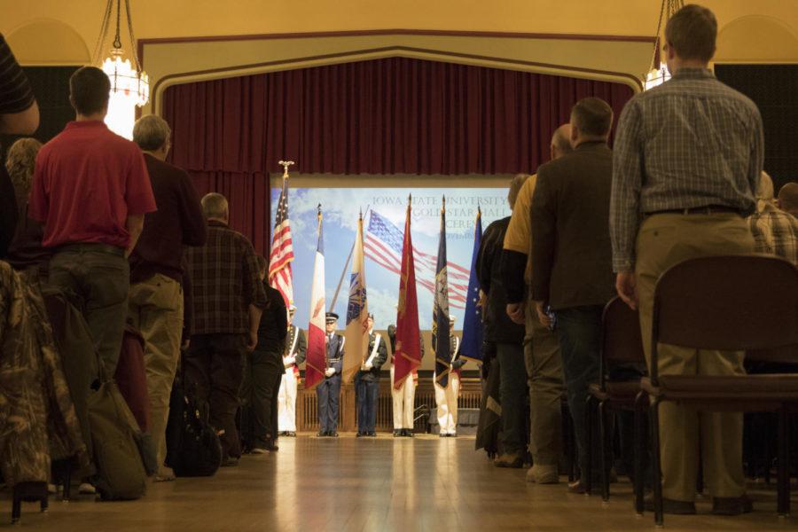 The national anthem is played as the colors are presented by Iowa State ROTC members at the Gold Star ceremony on Nov. 6. The ceremony is held each year in observation of Veterans Day. Four veterans were honored at the event: World War II serviceman Robert Geoffroy as well as Vietnam servicemen Wheeler Brooks, Jeffrey Krommenhoek and James McGough.