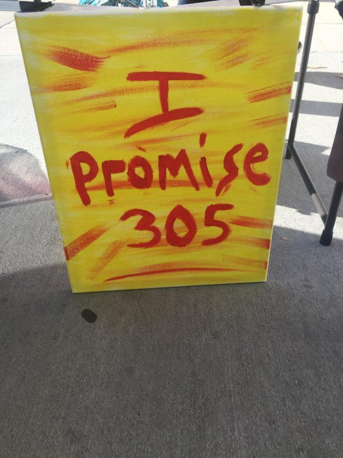 An easel painted for the I Promise 305 event. This event was held to remember the 305 lives lost in Sinai, Egypt during an attack at a mosque.