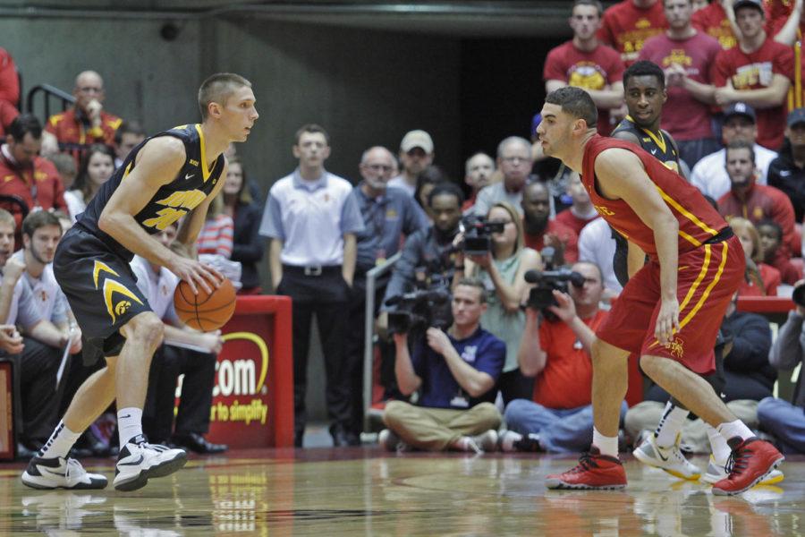 Jarrod Uthoff drives the ball against Georges Niang on Thursday.