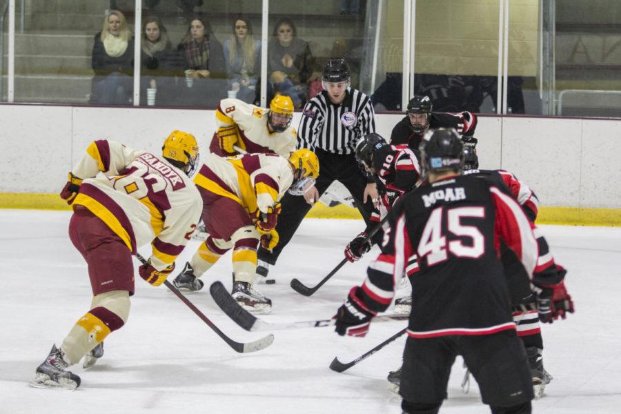Members+of+The+Cyclone+Hockey+team+get+set+for+the+puck+drop+Dec.+3+at+the+Ames+Ice+Arena+during+the+Iowa+State+vs+Minot+State+match+up.+The+Cyclones+were+defeated+by+Minot+State+4-1.