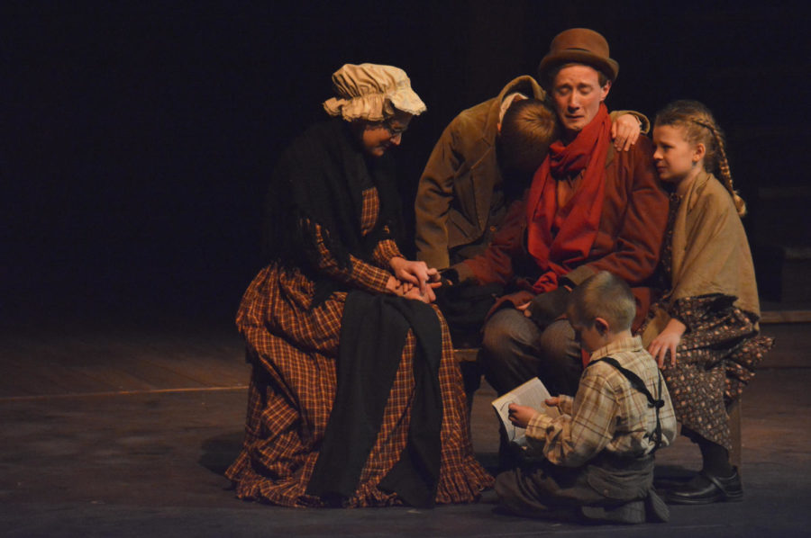 The Cratchit family despairs over the death of Tiny Tim during A Christmas Carol rehearsals at the Fisher Theater on Nov. 28. The play will run Dec. 1st, 2nd, 8th and 9th at 7:30 p.m., Dec. 3rd at 1 p.m. and Dec. 10th at 2 p.m.