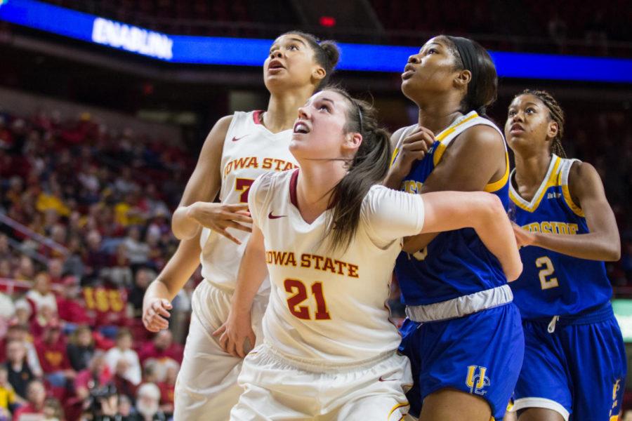 Members of the Iowa State Basketball Team defend a rebound during the Iowa State Vs UC Riverside basketball game Dec 17. The Cyclones Defeated Riverside 89-66