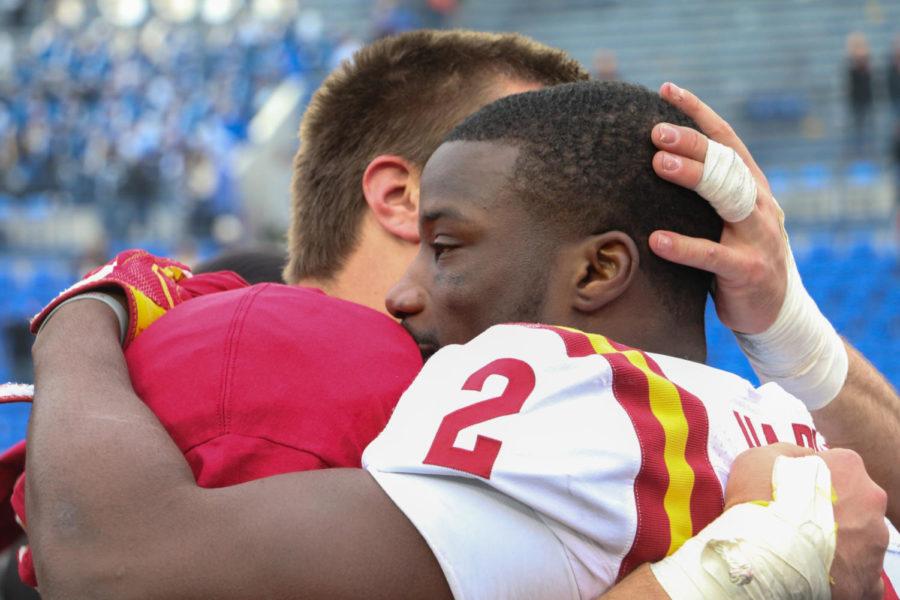 Iowa State linebacker Willie Harvey embraces defensive end J.D. Waggoner after the 59th Annual AutoZone Liberty Bowl in Memphis, Tennessee on Dec. 30, 2017. The Cyclones defeated the Tigers 21-20.