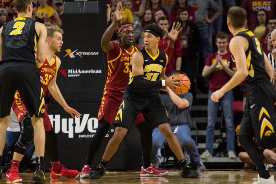 Sophomore+forward+Solomon+Young+plays+defense+during+the+Iowa+vs+Iowa+State+game+Dec.+7+in+Hilton+Coliseum.+Iowa+State+defeated+the+Hawks+84-78.