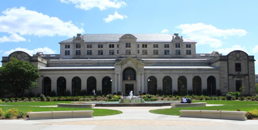 The Memorial Union, pictured in Sept. 2017. Students are sitting on the recently constructed benches near the Fountain of Four Seasons.