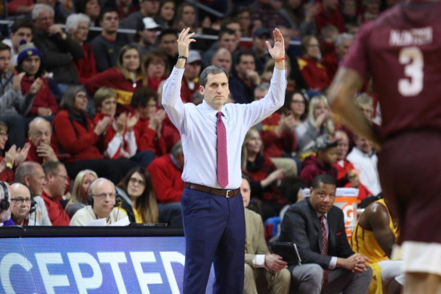 Iowa State head coach Steve Prohm tries to excite the crowd after a Solomon Young score during the first half against Maryland Eastern Shore.