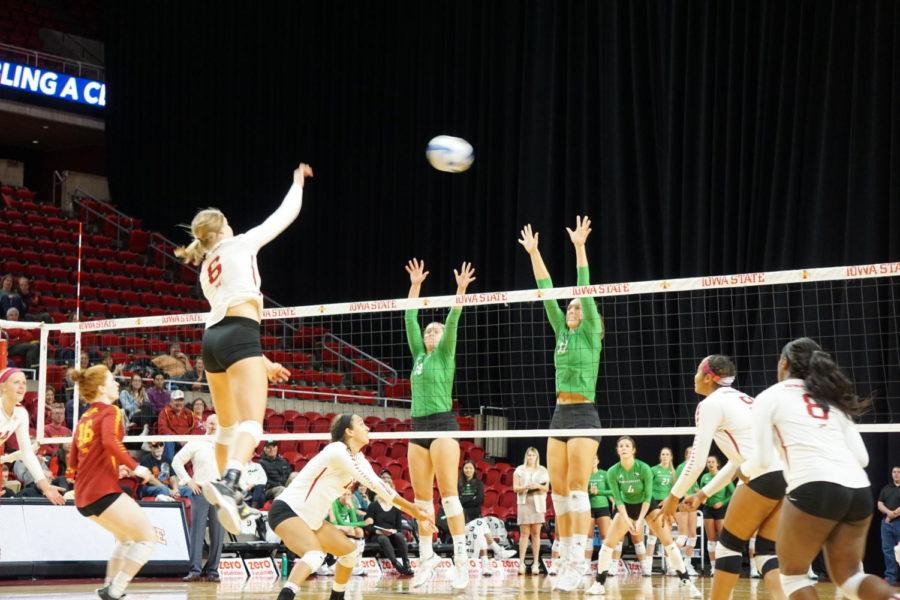 At the Iowa State womens volleyball game verses University of North Dakota on October 30th, Alexis Conaway spikes the ball over the net and helps Iowa State win 3-0.
