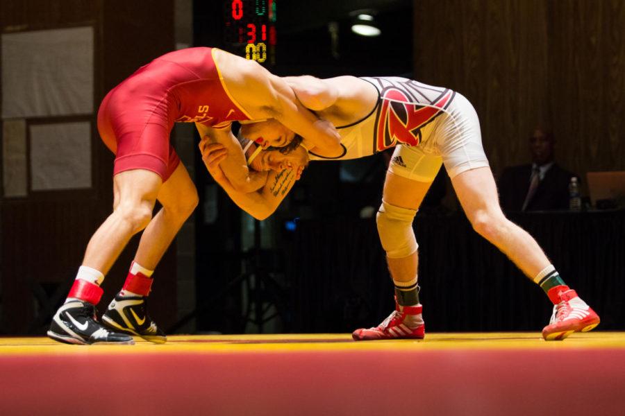 Redshirt Freshman Kanen Storr defeats Tyson Dippery Nov. 26 in Stephens Auditorium during the Iowa State vs Rider wrestling meet. The Cyclones were defeated 15-22. 