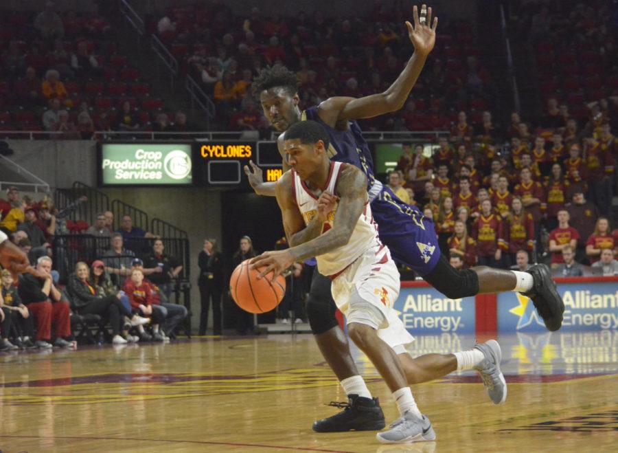 Donovan+Jackson%2C+guard%2C+dribbles+towards+the+basket+during+the+mens+basketball+game+against+Alcorn+State+on+Dec.+10+at+Hilton+Coliseum.+The+Cyclones+won+78-58.