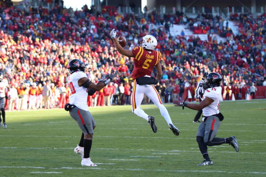 Iowa State wide receiver Allen Lazard makes a one handed grab during the first half against Texas Tech on Nov. 19, 2016. Lazard would drag the defenders into the end zone after the catch for a touchdown.