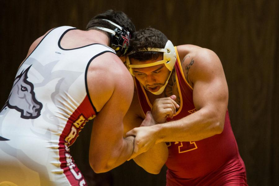 Redshirt+Junior+Marcus+Harrington+starts+off+the+Iowa+State+Vs+Rider+wrestling+meet+with+win+over+Ryan+Cloud+Nov.+26+in+Stephens+Auditorium.+The+Cyclones+were+defeated+15-22.