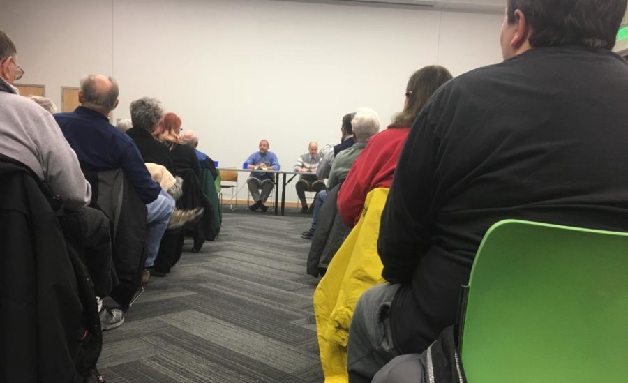 Candidates for the 4th district John Paschen and J.D. Scholten answer questions from Ames citizens during town hall meeting at the Ames Public Library. The event took place from 6 p.m. to 8 p.m. on Thursday night