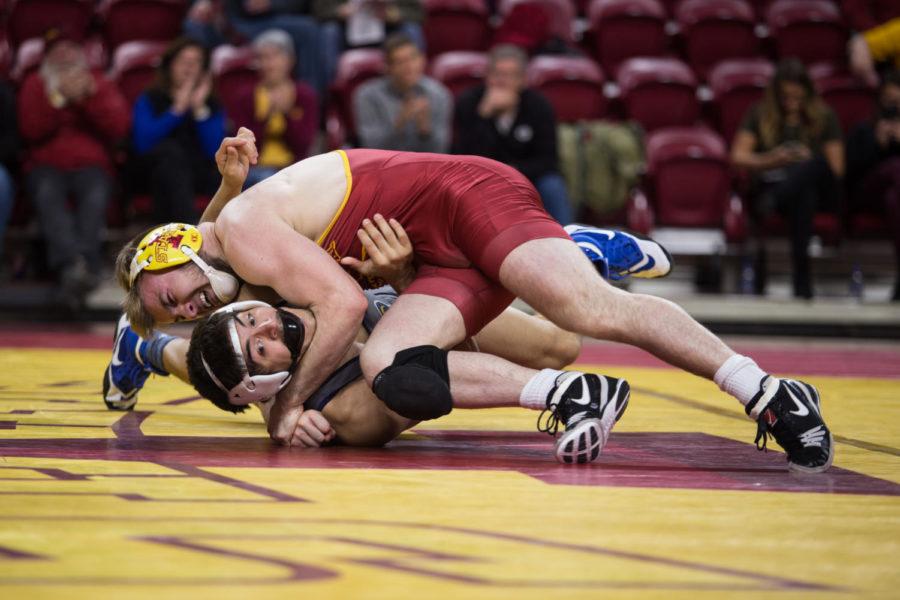 Redshirt+Junior+Logan+Breitenbach+wrestles+against+Northern+Colorado+wrestler+Keilan+Torres+Jan.+5+in+Hilton+Coliseum.%C2%A0+The+cyclones+were+narrowly+defeated+by+the+UNC+Bears+20-22.%C2%A0