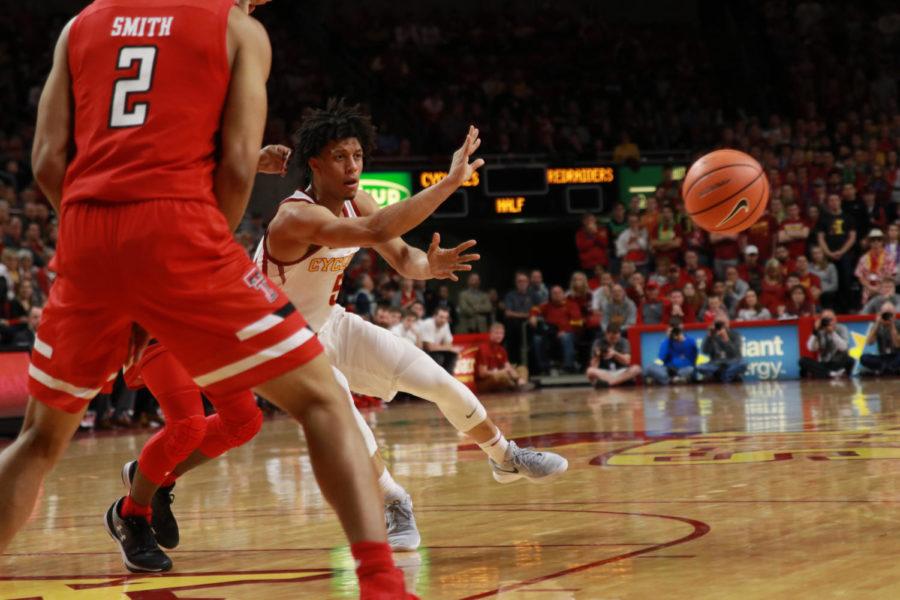 Iowa State freshman Lindell Wigginton dishes a pass during the first half of the Cyclones' 70-52 win over No. 8 Texas Tech. Wigginton finished with 13 points. 