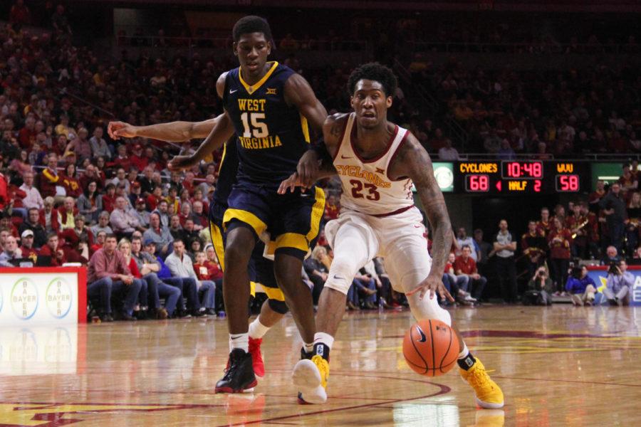 Junior Zoran Talley Jr. making his way into Mountaineers territory during their game against the WVU on Jan. 31 at the Hilton Coliseum.