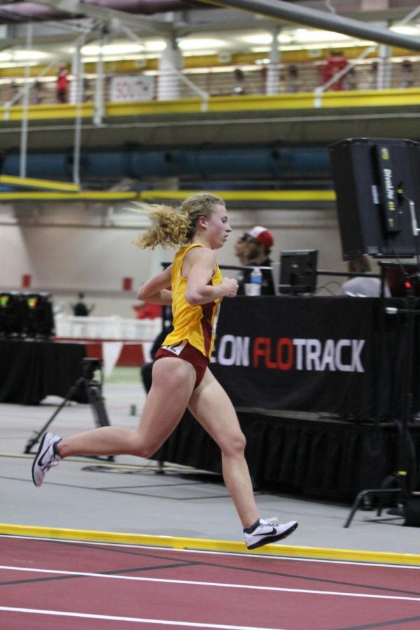 Sophomore Megan Schott runs in the Womens 5000 Meter Feb 24th during the Big 12 Track and Field Meet. Schott came in 16th with a time of 16:57.765