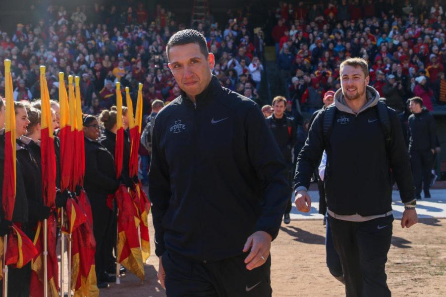 Iowa State head coach Matt Campbell and linebacker Joel Lanning walk onto the field during the Cyclone Spirit Rally at AutoZone Park in Memphis, Tennessee on Dec. 29, 2017.