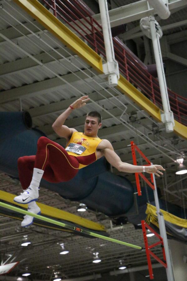Freshman Wyatt Rhoads clears the bar during the pole vault as part of the mens heptathalon at the Big 12 Indoor Championships held at the Lied Rec Center on Feb. 27. 