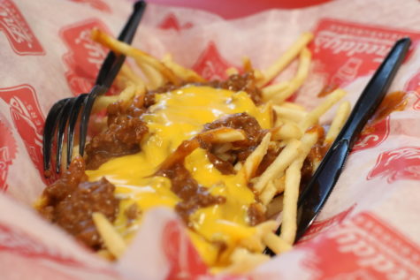 One menu item at Freddys, which held its grand opening Thursday, is chili cheese fries.