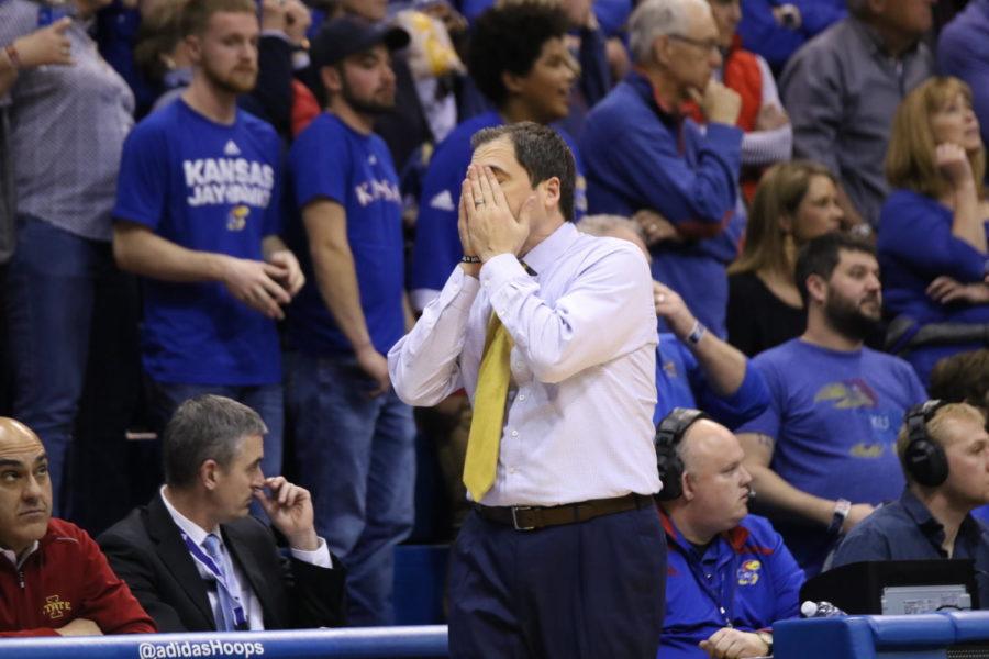 Iowa State head coach Steve Prohm buries his head in his hands after an intentional foul is called on the Cyclones in the final minutes of the 83-78 loss at Kansas.