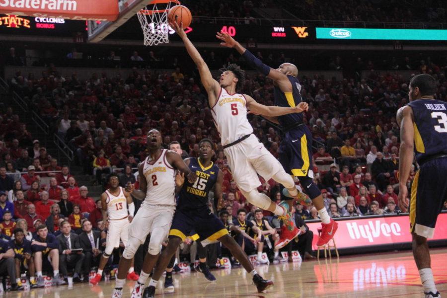 Freshman Lindell Wigginton attempts a two point shot during the first half of the game against West Virginia in Hilton Coliseum on Jan. 31.