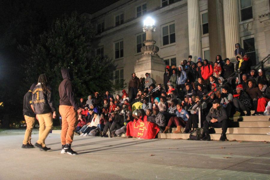 Members of Alpha Phi Alpha Fraternity addressing all the spectators who came to the NPHC Homecoming Yard Show.