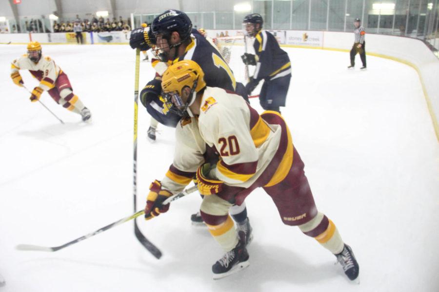 #20 Anthony Song duking it out with a player from the University of Central Oklahoma on Nov. 10th at the ISU Ice Arena.