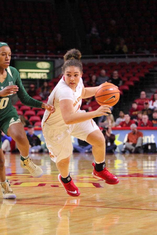 Freshman Rae Johnson making her way past her opponents during their game against the Baylor Bears on Jan. 17 at the Hilton Coliseum.