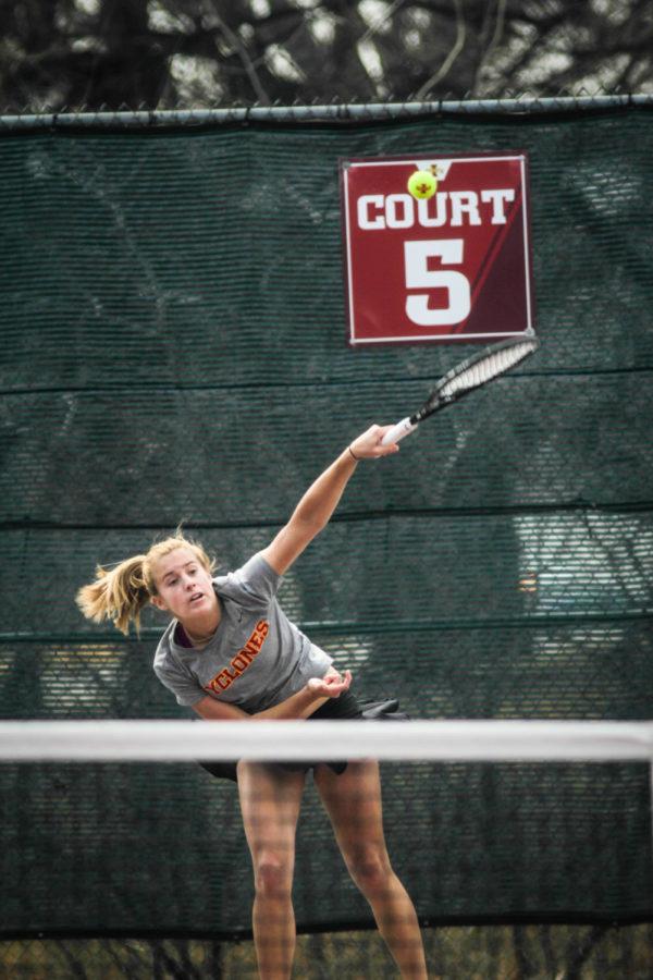 Senior Emma Waites drives a serve into her Texas Tech opponents court at the Cyclone womens meet against Texas Tech on March 30. Waites is one of  the senior ladies being celebrated for the Cyclone womens Senior Night. 