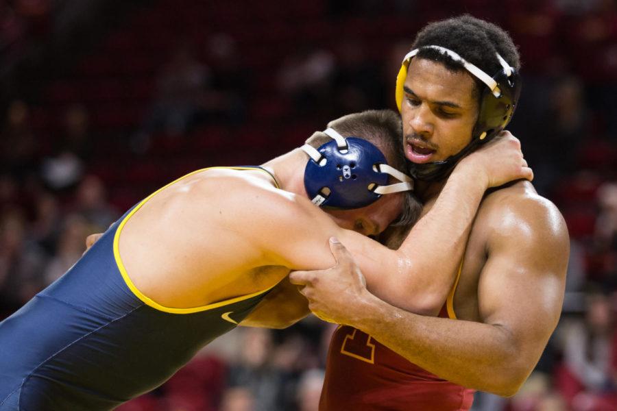 Iowa State Redshirt Freshman Sam Colbray Wrestles Jacob A. Smith during the Iowa State vs West Virginia wrestling meet Jan. 21. The Cyclones Defeated West Virginia 25-16.