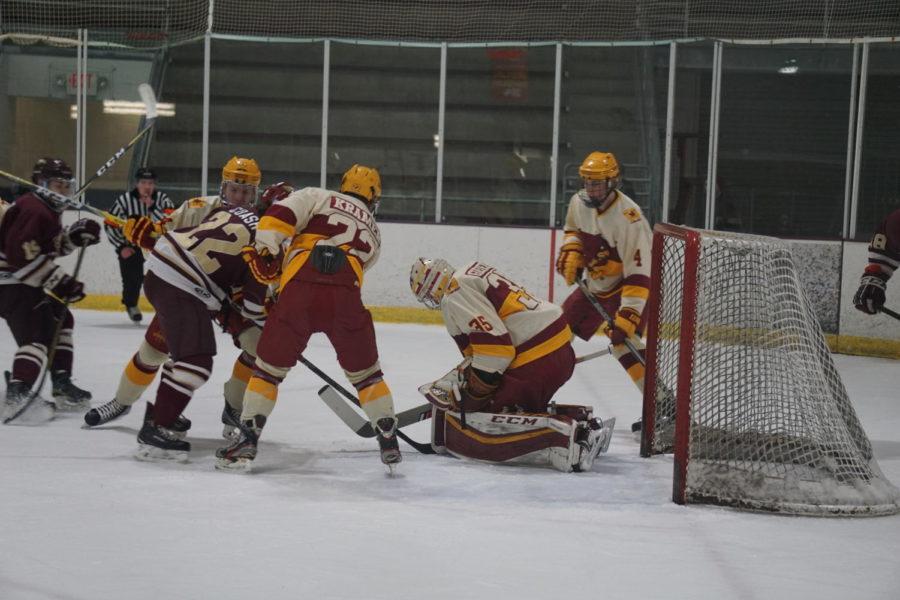 At the Iowa State VS Rob Morris hockey game on January 19th, Iowa State players surround senior Matt Goedeke in an attempt to prevent a goal against Iowa State.