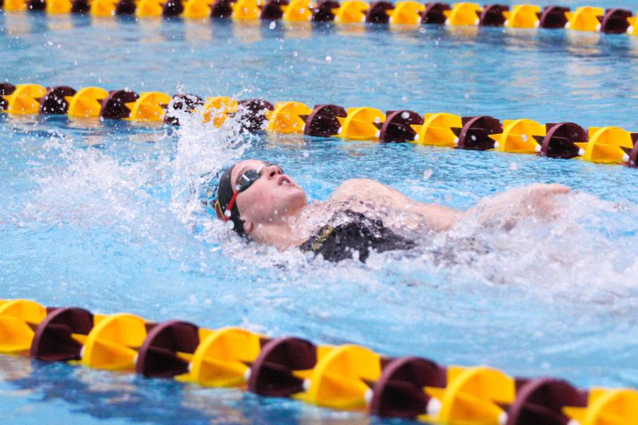 a+member+of+the+Iowa+State+Swim+and+Dive+Team+swimming+the+100+backstroke+during+their+duel+meet+against+the+Kansas+Jayhawks+on+Feb.+2+at+Beyer+Hall.