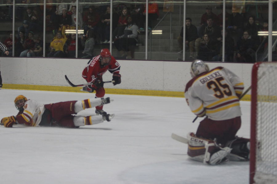 Junior Matt Goedeke has a fast save in the third period Friday night against Utah. The Cyclones ended with a win 6-2.