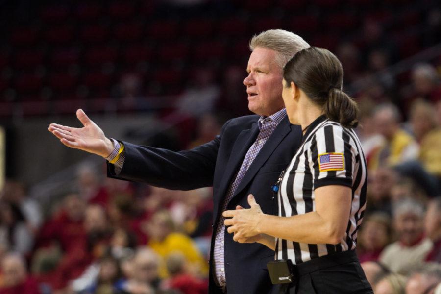 Head Coach Bill Fennelly talks with the ref after a questionable call during the Iowa State Vs UC Riverside basketball game Dec 17. The Cyclones Defeated Riverside 89-66