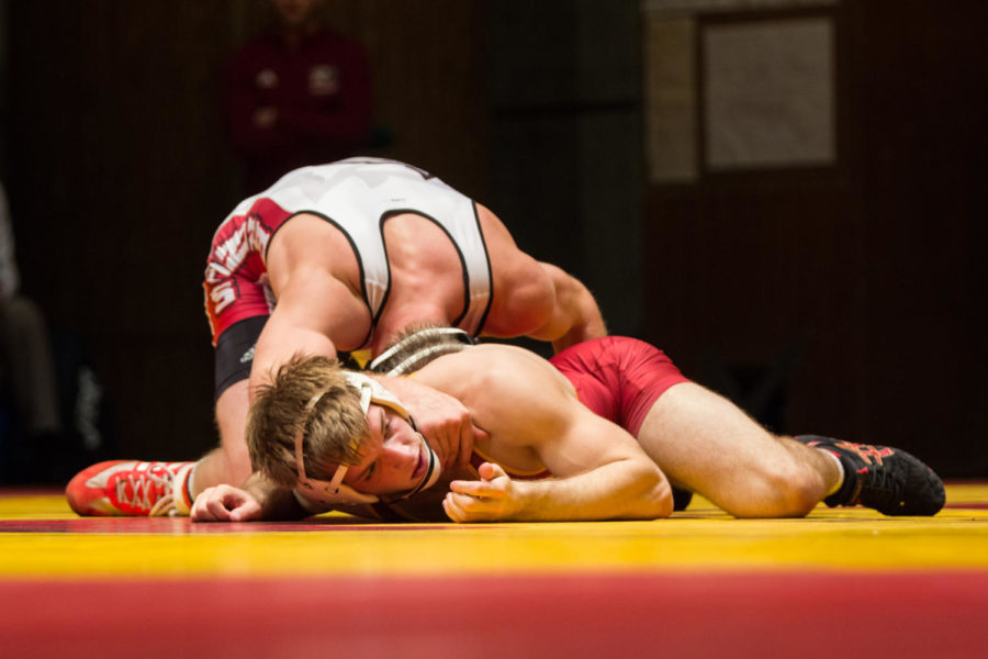 Redshirt sophomore Colston DiBlasi Looks to coaches Nov. 26 in Stephens Auditorium during the Iowa State vs Rider wrestling meet. The Cyclones were defeated 15-22. 