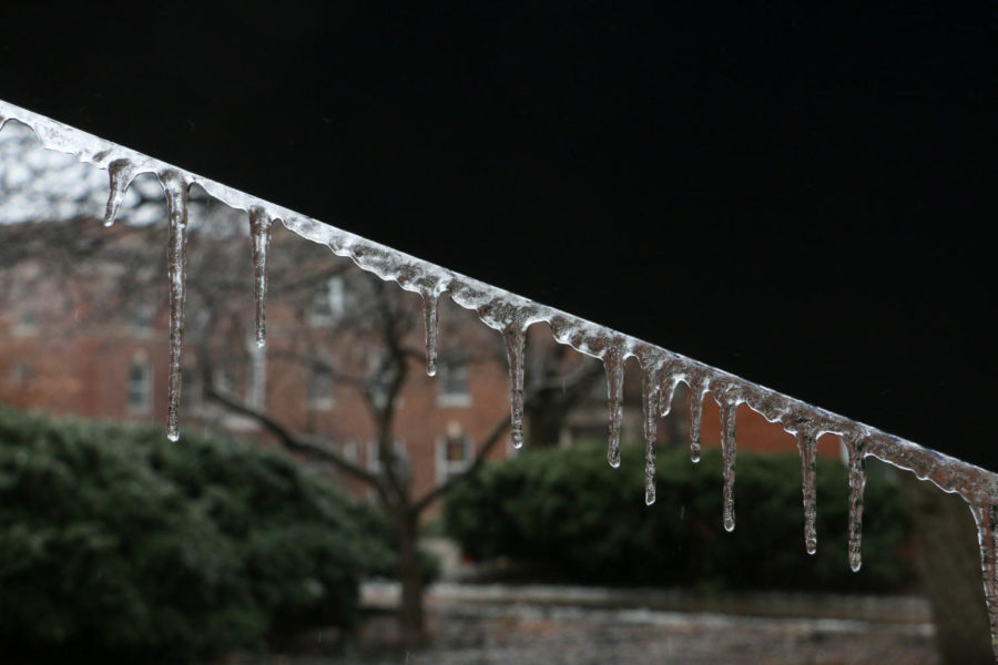 Icicles hang off of Bruce Whites Carom sculpture Jan. 16. Freezing rain is expected to continue to fall throughout Monday. 