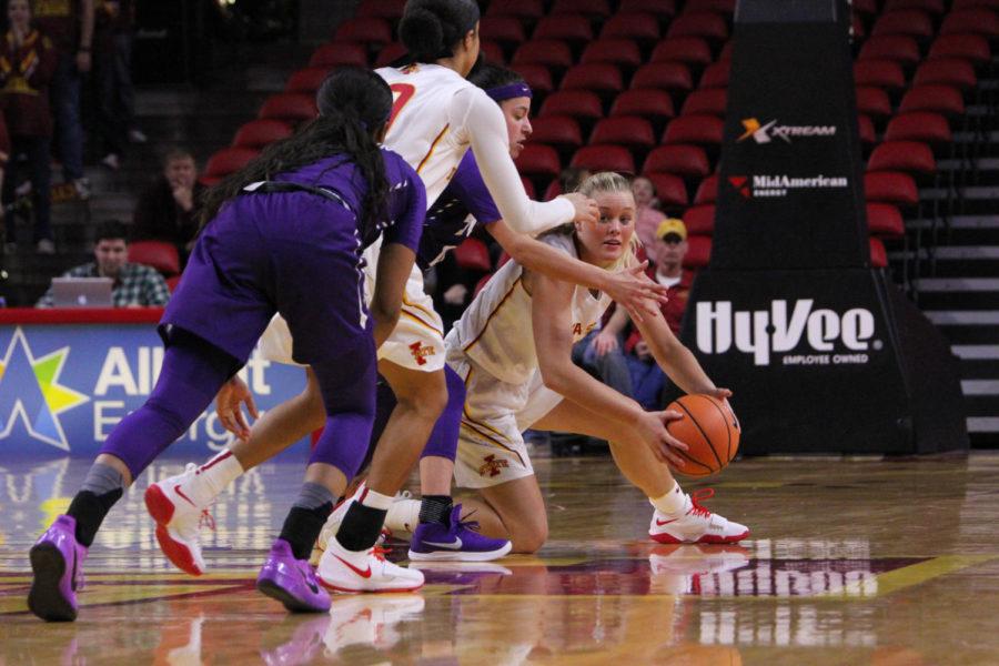 Freshman Madison Wise recovering a fumbled ball from the TCU Horned Frogs and turning it around for the Cyclones at the Hilton Coliseum on Jan. 30.