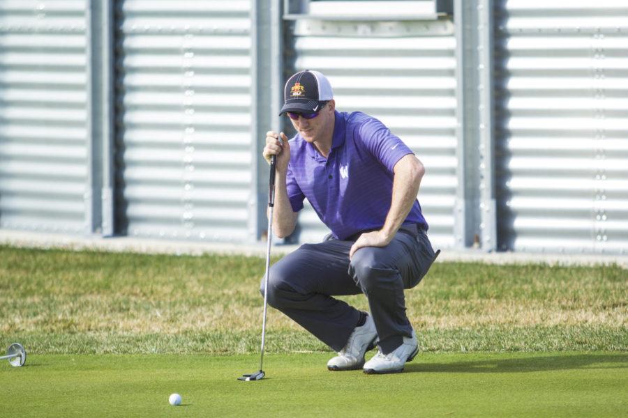 Redshirt junior golfer Collin Foster lines up a putt at practice on April 14. He led Iowa State at the Bridgestone Golf Collegiate by tying for 24th place.