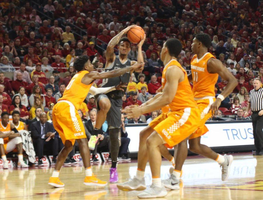 Iowa State junior Nick Weiler-Babb drives into multiple defenders during the first half against Tennessee on Jan. 27.
