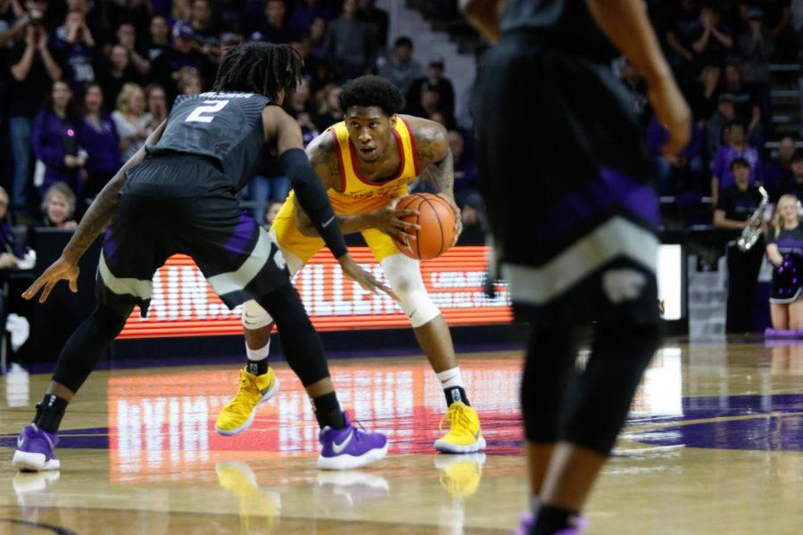 Iowa State redshirt junior Zoran Talley Jr. sizes up a defender in the first half of Iowa State's 78-66 loss at Kansas State. The Cyclones remain winless on the road. 