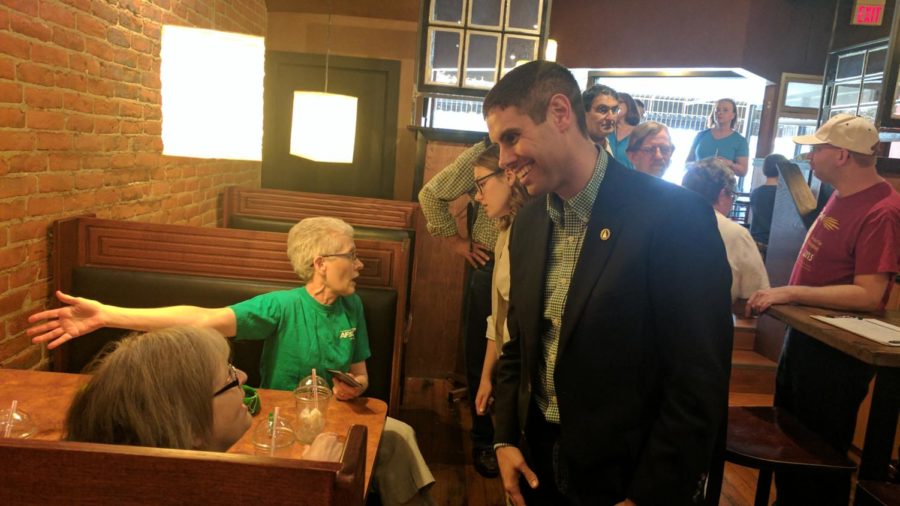 Nate Boulton held a meet and greet with Ames voters at Cafe Diem. He told voters they were in a fight for the soul of our state.