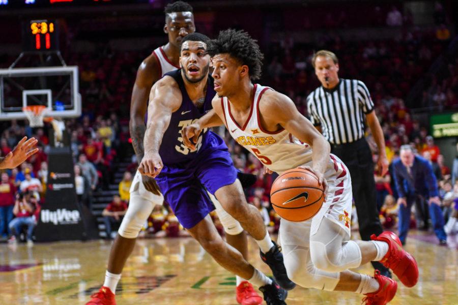Freshman+Lindell+Wigginton+moves+into+Horned+Frog+territory+during+their+game+against+TCU+on+Feb.+21+at+the+Hilton+Coliseum.%C2%A0