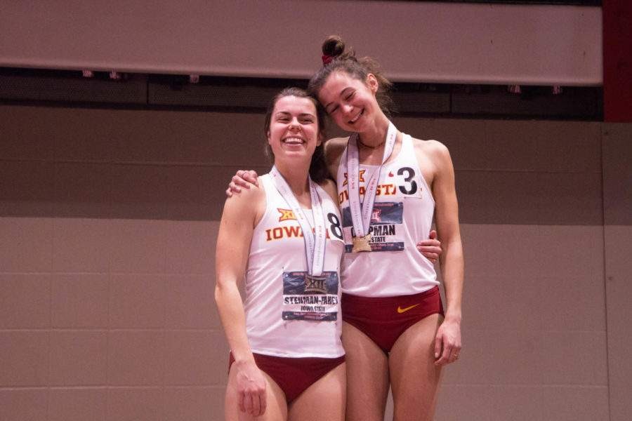 First and second place finishers sophomore Larkin Chapman and junior Erinn Stenman-Fahey smile on the podium after their wins in the Women's 1000 M Final at the Big 12 Track and Field Championship at Lied Rec. Center on Feb. 24. 