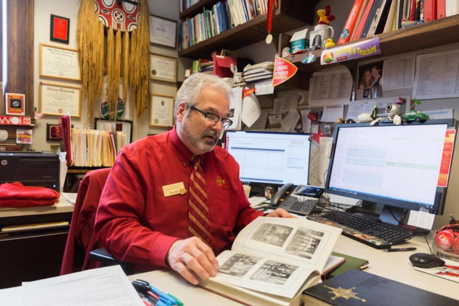 Iowa States Director of Transfer Relations, Outreach Adviser Dan Rice Sits in his office surrounded by Iowa State Memorabilia.  