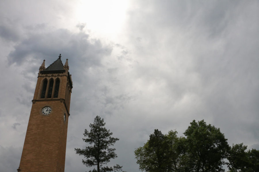 Clouds cover the sun over the Campanile during the solar eclipse Monday, Aug. 21.