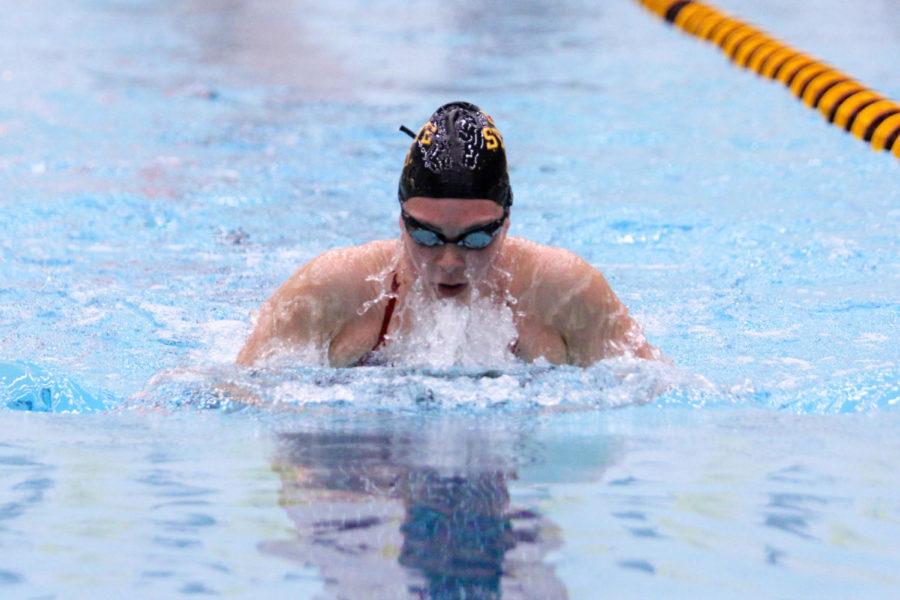 A member of the Iowa State Swim and Dive Team swimming the 100 breaststroke during their duel meet at Beyer Hall against the Kansas Jayhawks on Feb. 2.